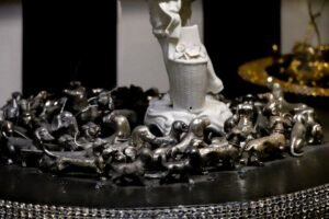 A detailed dog figurine sculpture — example of a custom pet keepsake from a photo